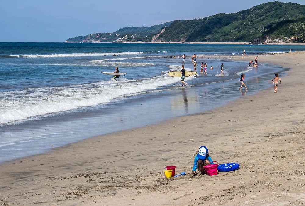 Sayulita Mexico beach sufer kids in sand what to do in the Riviera Nayarit